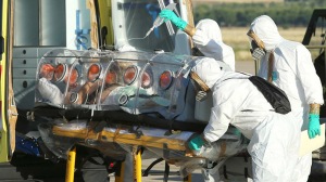 A handout picture taken and released on August 7, 2014 by the Spanish Defense Ministry shows Roman Catholic priest Miguel Pajares, who contracted the deadly Ebola virus, being transported from Madrid's Torrejon air base to the Carlos III hospital upon his arrival in Spain. (AFP Photo)