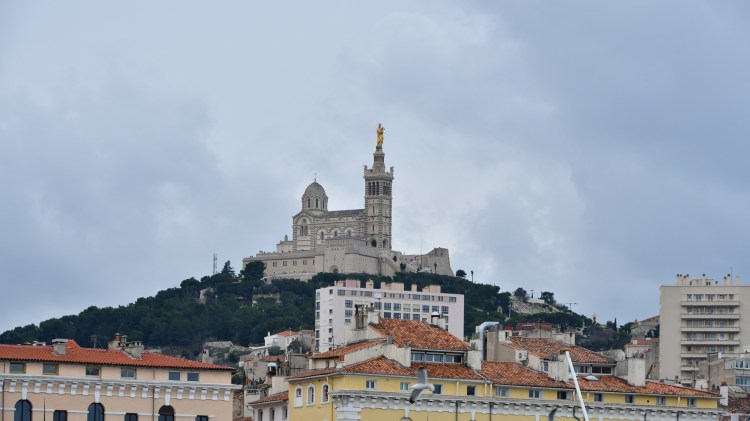 church on top of a hill overlooking marseilles
